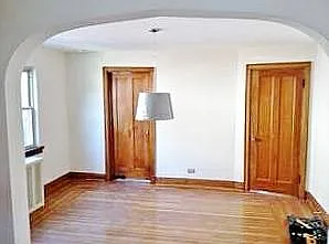 Beautiful hardwood floors and woodwork. Dining room without