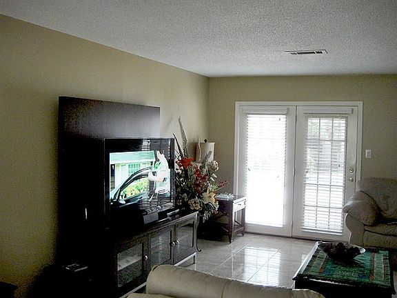One of the living areas with tile flooring throughout.