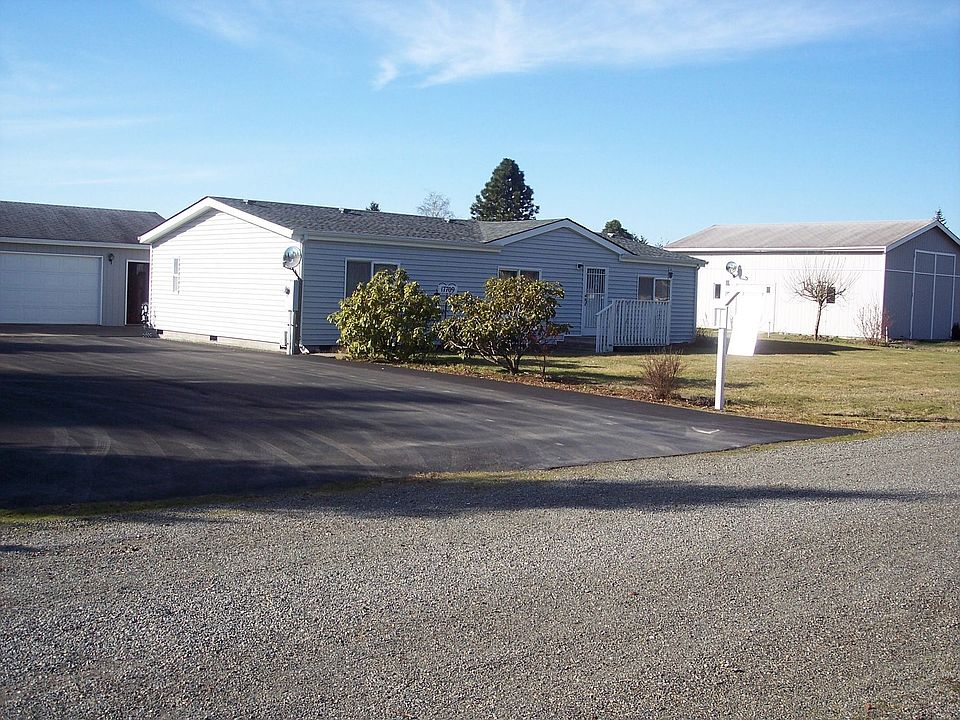 This home features two large garages and an incredible amount of parking!
