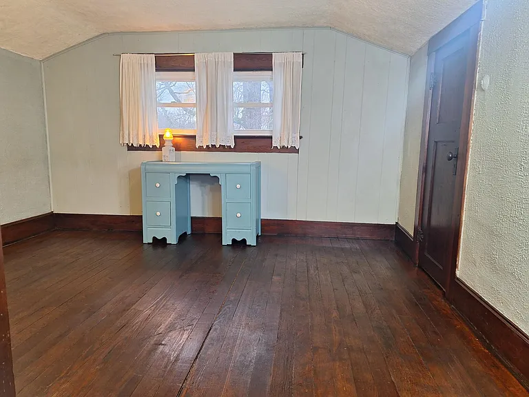 Upstairs bedroom with closet