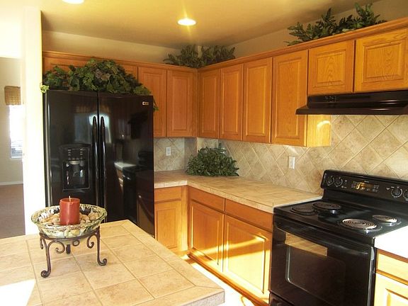 Large Kitchen with wood flooring