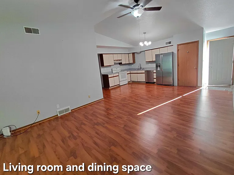 There is a closet next to the fridge.