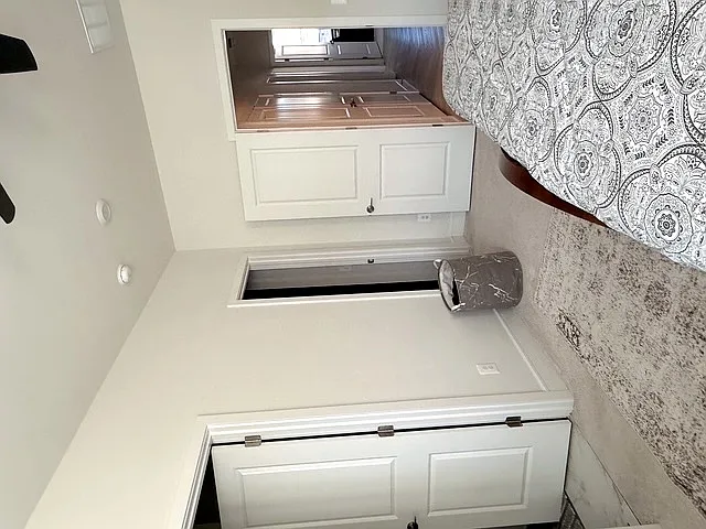 Master bedroom view showing entrance to attached bath and walk in closet