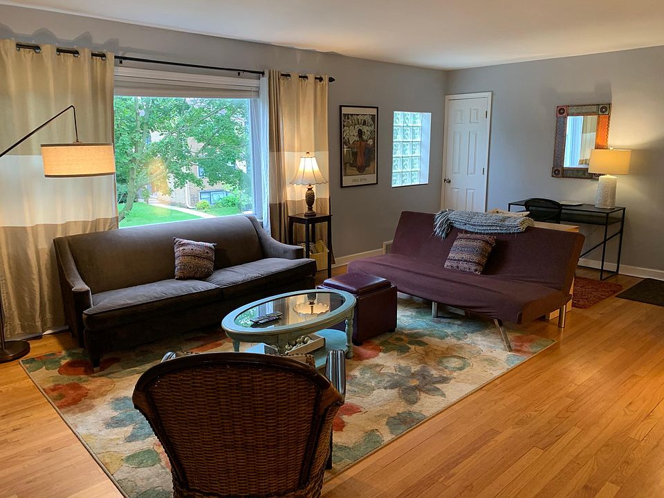 Fully furnished, large, sunny living area with work nook