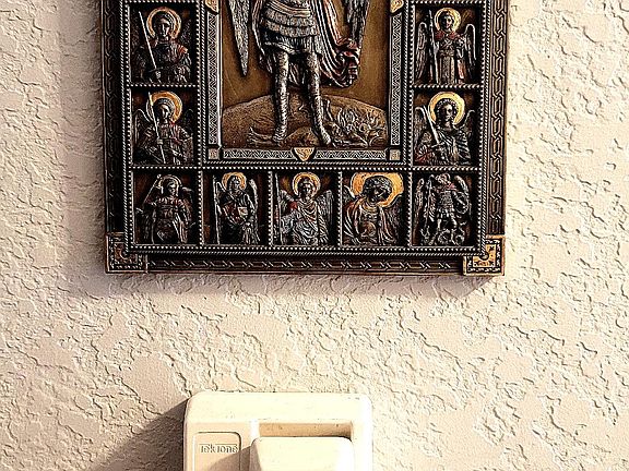 Decorative Wall Plaque, Intercom Telephone, Old World Knock Down Wall Finish (Featured Throughout Apartment).