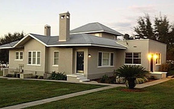 The door on the far right with the two lights on is the door to unit #1.