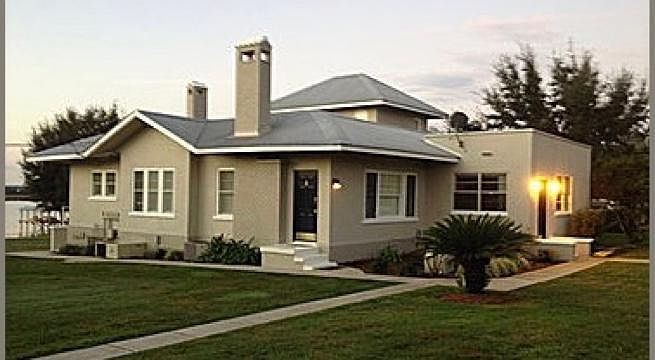 The door on the far right with the two lights on is the door to unit #1.