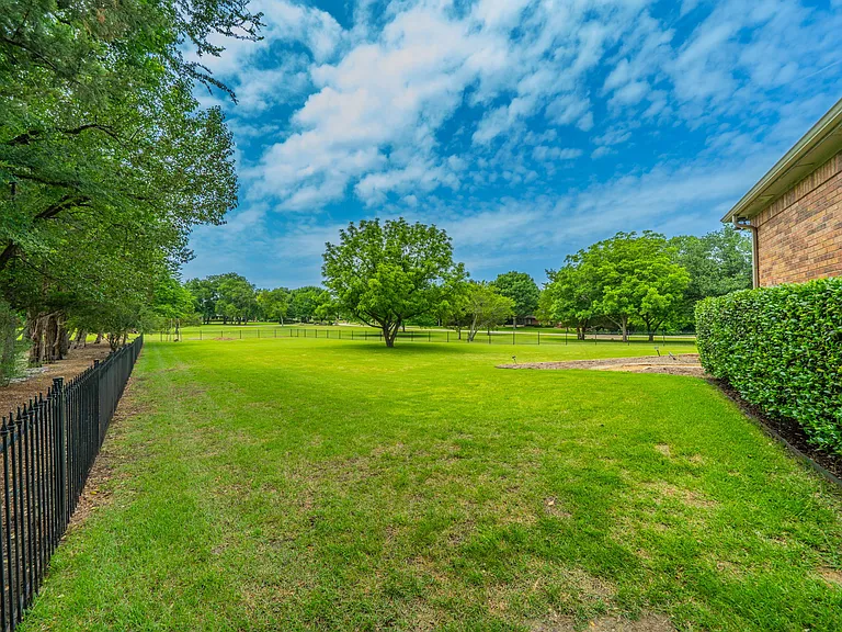 Private & Secluded: Large Fenced Yard with Lush Tree-Lined Privacy