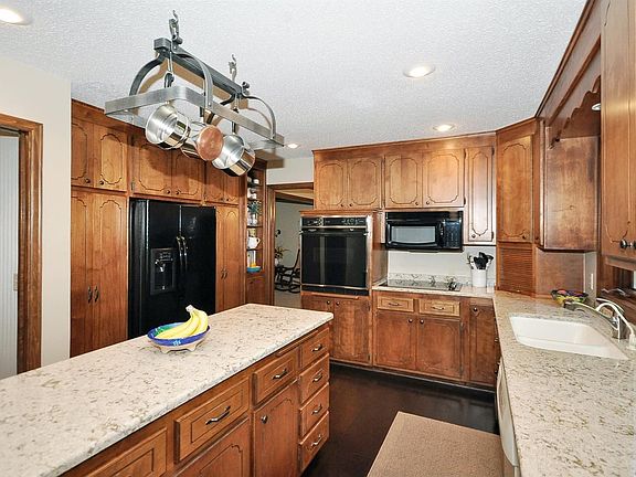 Harwood floor, Cambria counter tops, built-in oven and more