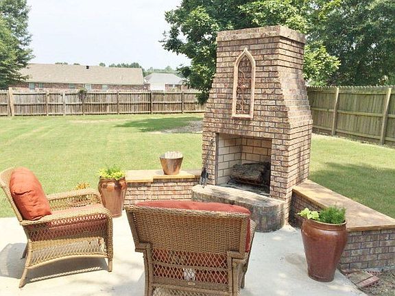 Backyard and fireplace patio
