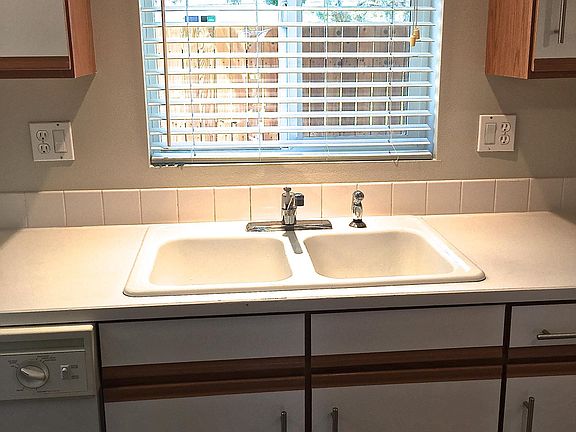 Nice view from kitchen window to backyard.