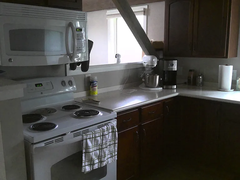 Kitchen, stove, microwave, passthrough area