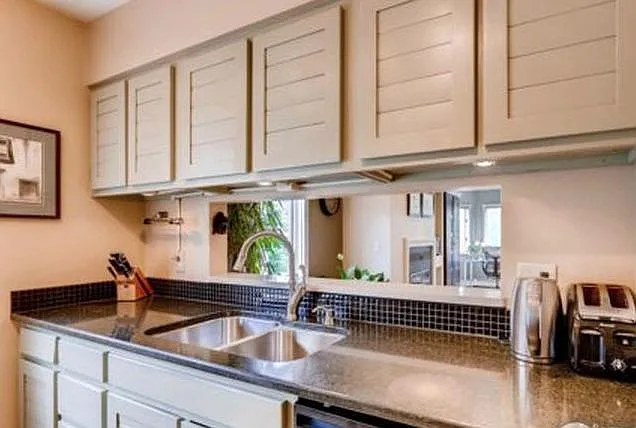 Granite counters, soft-close cabinets.