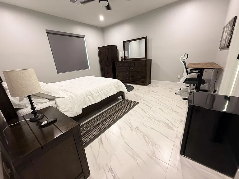 Ceiling fan with remote, mini-fridge and electric rising desk and ergonomic chair