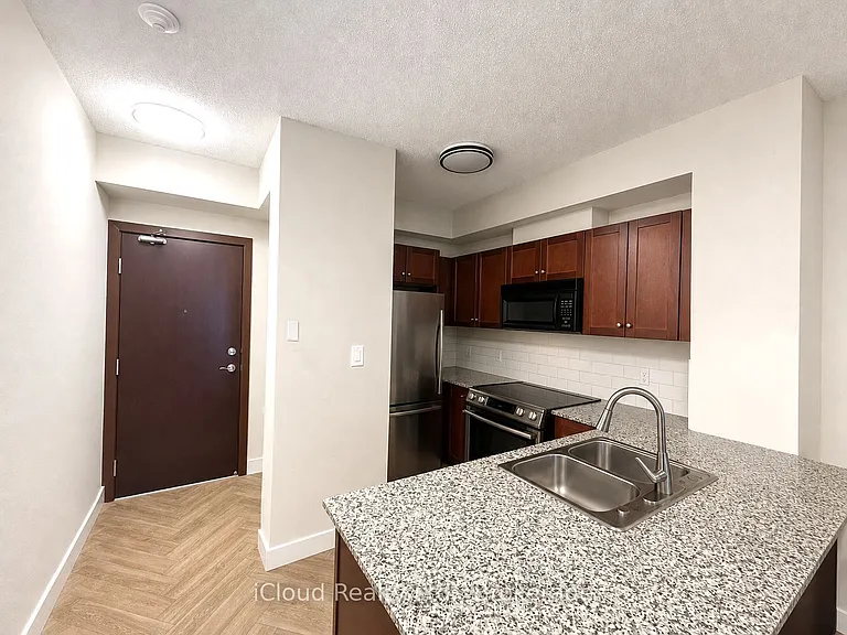 1359 Rathburn Rd E #408 — Photo 5
