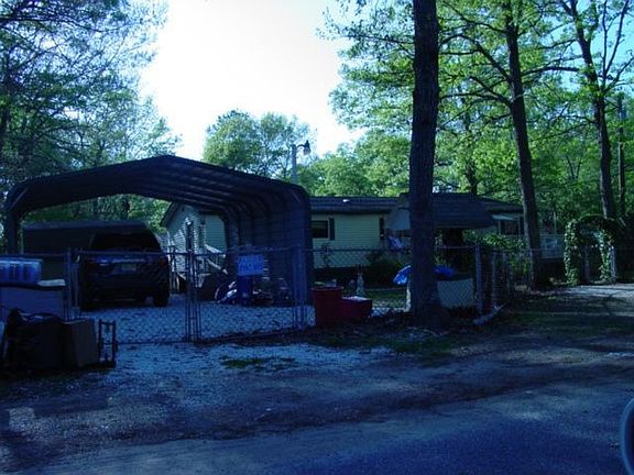 Steel carport & handicap accessible home 
