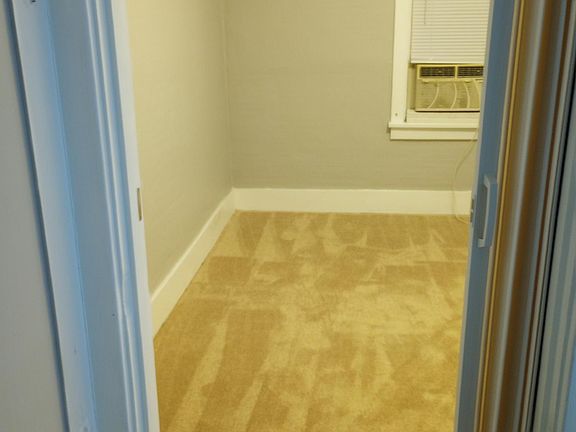 One of the bedrooms. AC here. No closet, but lots of closet space just outside the room which is the end of the upstairs hallway