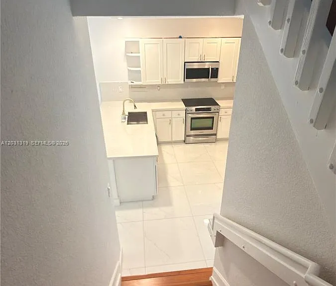 10737 NW 76th Ln — Photo 21