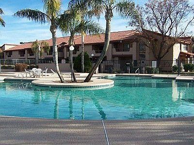 Resort-style pool next to Tennis Court.