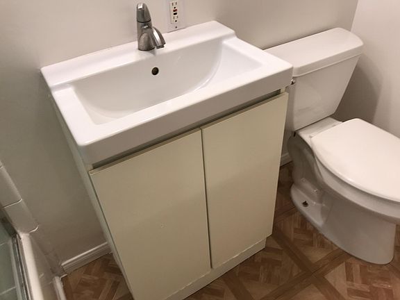 Bathroom sink and toilet