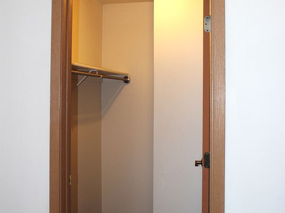 The master bedroom closet in this typical Marsh 1BR features