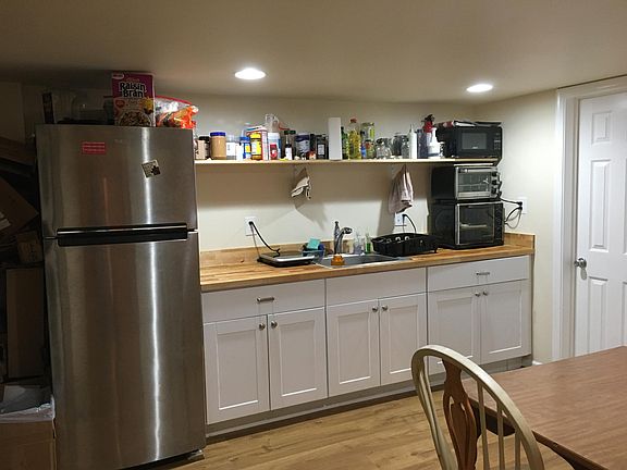 Kitchenette with appliances, food shelf! (separate pantry closet, too)