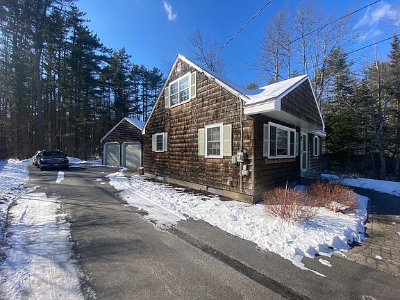 Left side of house and driveway