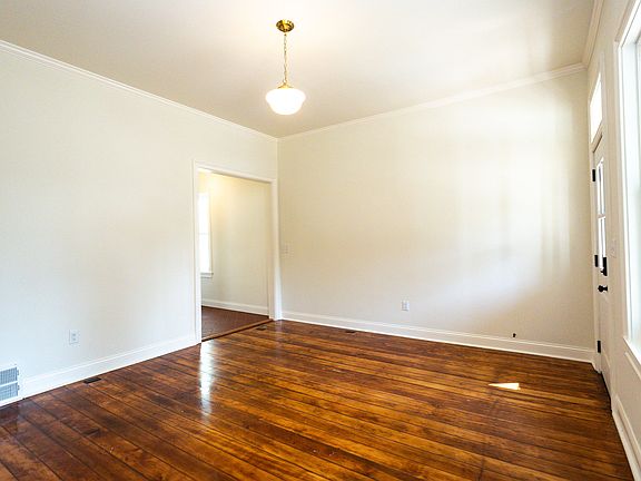 Living room with opening to the hallw