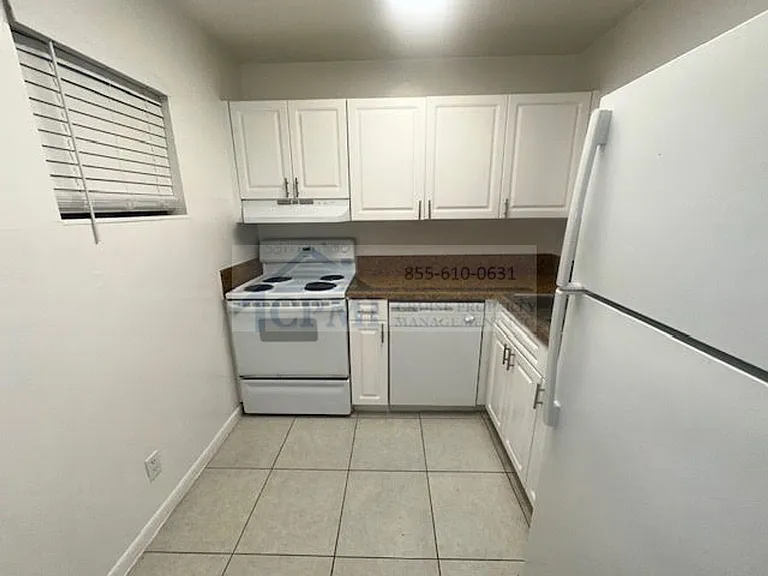 Colonial Village - 7550 Stirling Rd — Photo 33