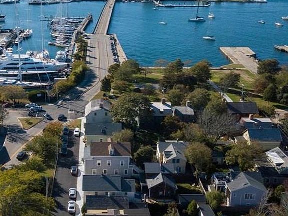 Tucked into a private courtyard in The Point, adjacent to Newport Shipyard, Storer (dog) Park and Goat Island, one row back from the harbor.