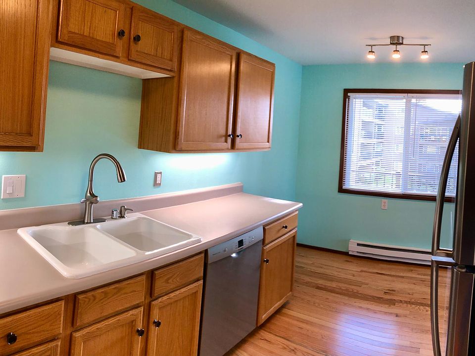 Kitchen sink and view to dining area window.