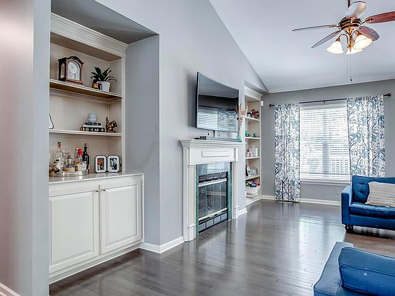Main floor living room with plenty of natural light