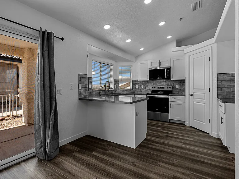 Dining are looking into kitchen.
