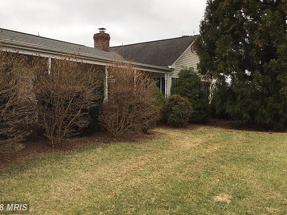 Front of house *before* shrubs pulled out/trimmed