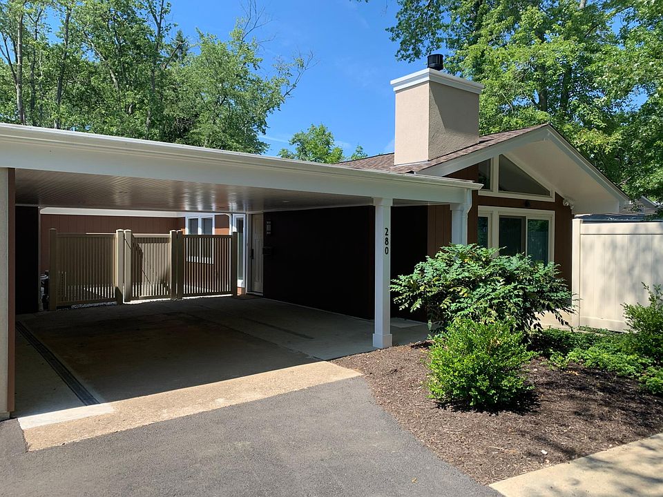 carport for 1 car and parking for another
