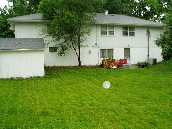 Storage Shed and Rear of Home