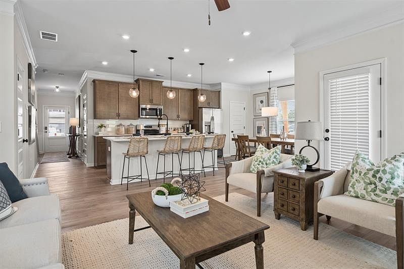 Builder's decorated model home and are for illustrative purposes only. Actual home vary in design, features, and finishes.