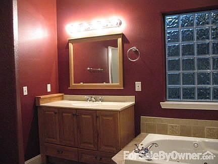 Master Bathroom : One of the two his and her sinks with spa/jaccuzi