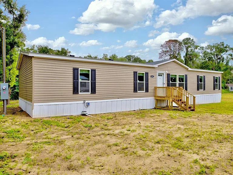 8595 NW 13th Ct — Photo 1