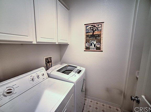 Perfect size Laundry Room with counter space and storage