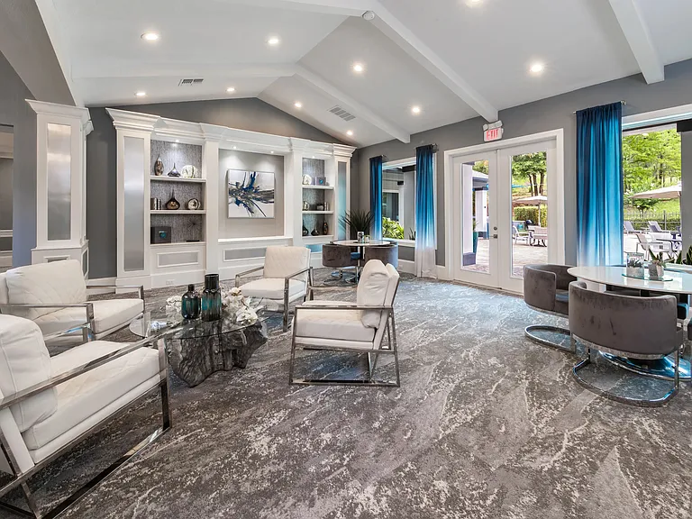 The leasing office at Elevate 155 features sleek designer finishes, vaulted ceilings, and cozy seating areas perfect for relaxing or meeting with neighbors.