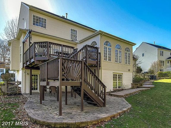 Rear deck with paver patio and stairway