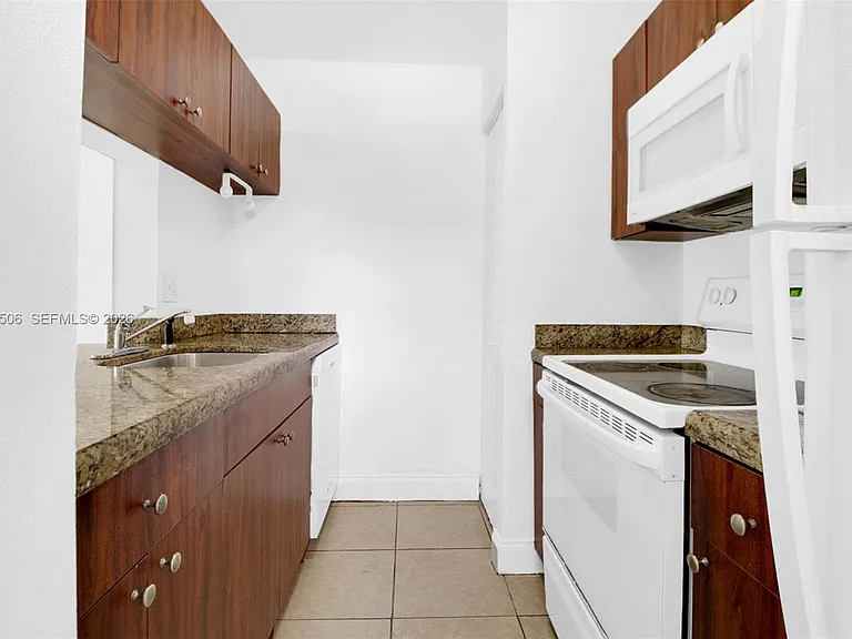 9730 Hammocks Blvd #203-28 — Photo 2