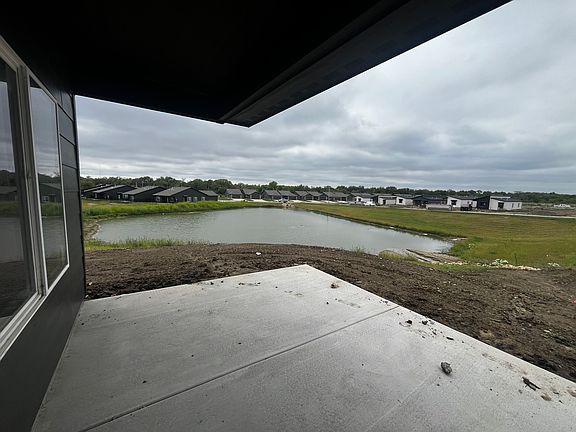 Yards will be installed very soon. Great view of the pond from this patio