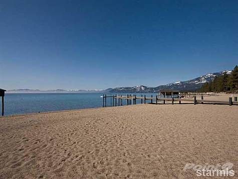 Pine Cone Circle HOA Amenities include Sandy Beach, Pier and Buoy Field.