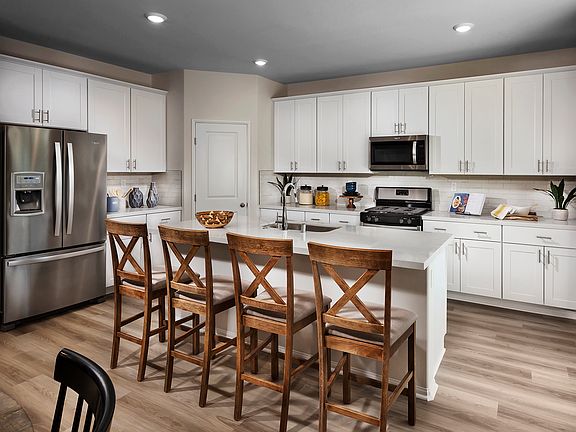 Residence 2 kitchen modeled at a nearby Meritage community.