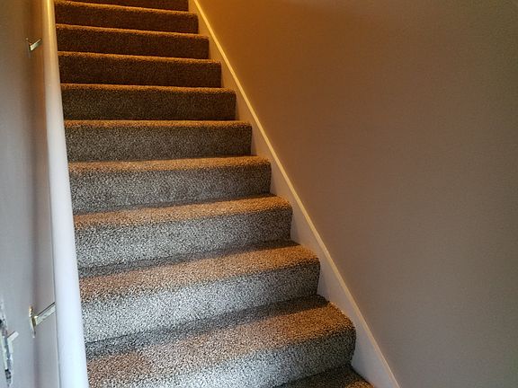2 story neutral carpeting