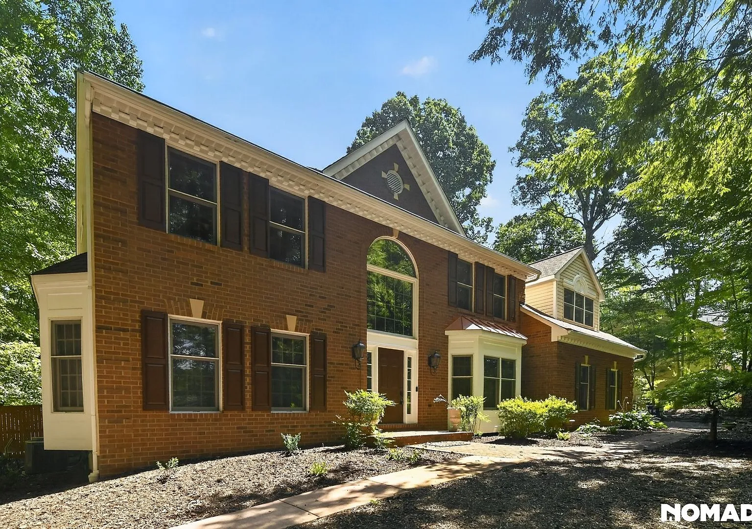 "House on a Hill" Blends Convenience and Wooded Retreat — Photo 3