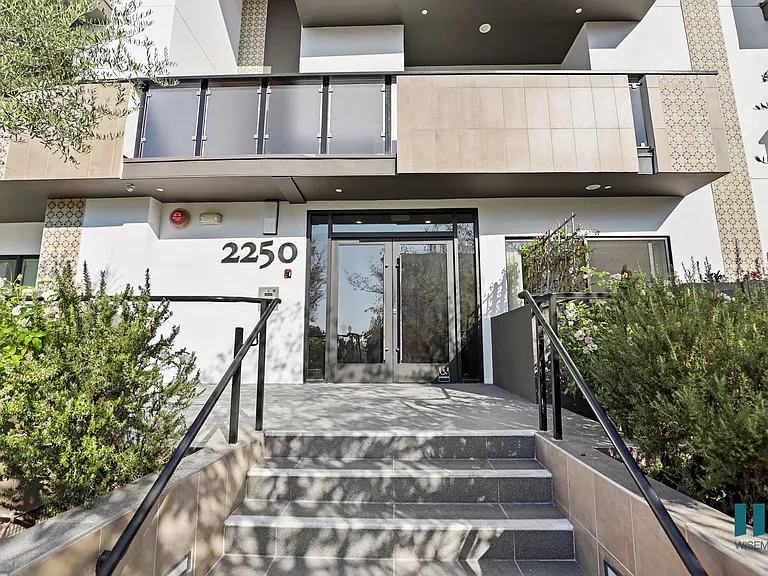 Front Entrance of a Fox Hills Dr by Wiseman