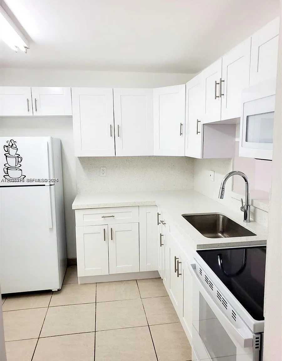 5199 NW 7th St — Photo 3